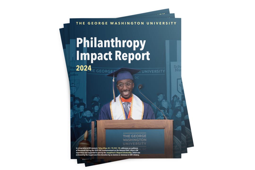 A stack of printed copies of the Philanthropy Impact Report 2024